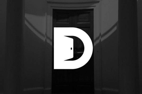 Capital D with a door opening in its negative space