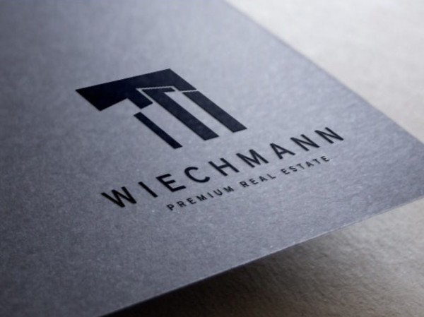 Wlechmann Real Estate business card